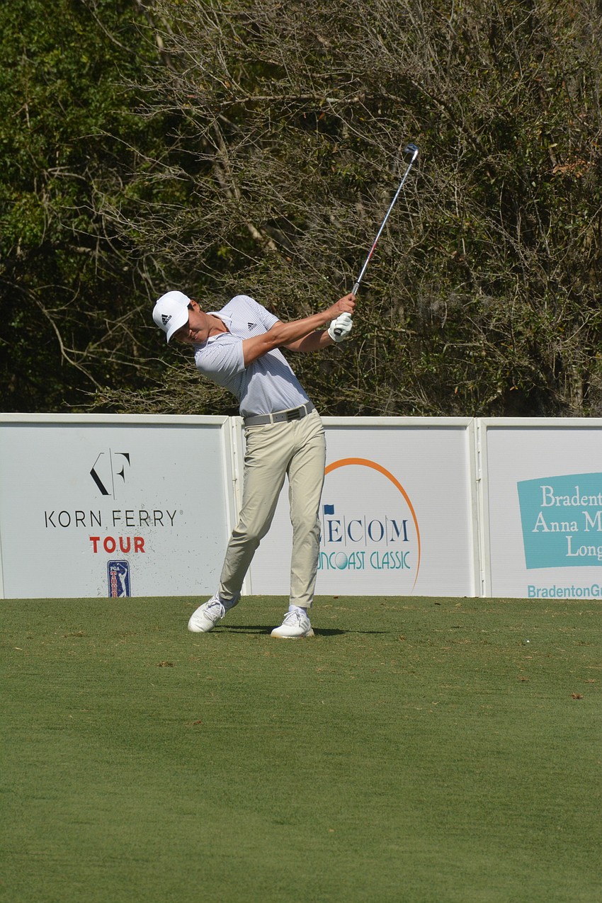 Brandon Wu tees off on the No. 17 hole at Lakewood National. Wu would par the hole and finish the day two under par, eight under par for the tournament.