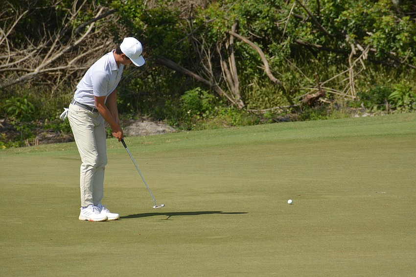 Brandon Wu putts for a bogey on the No. 16 hole at Lakewood National. Wu would finish the day two under par and eight under par for the tournament.