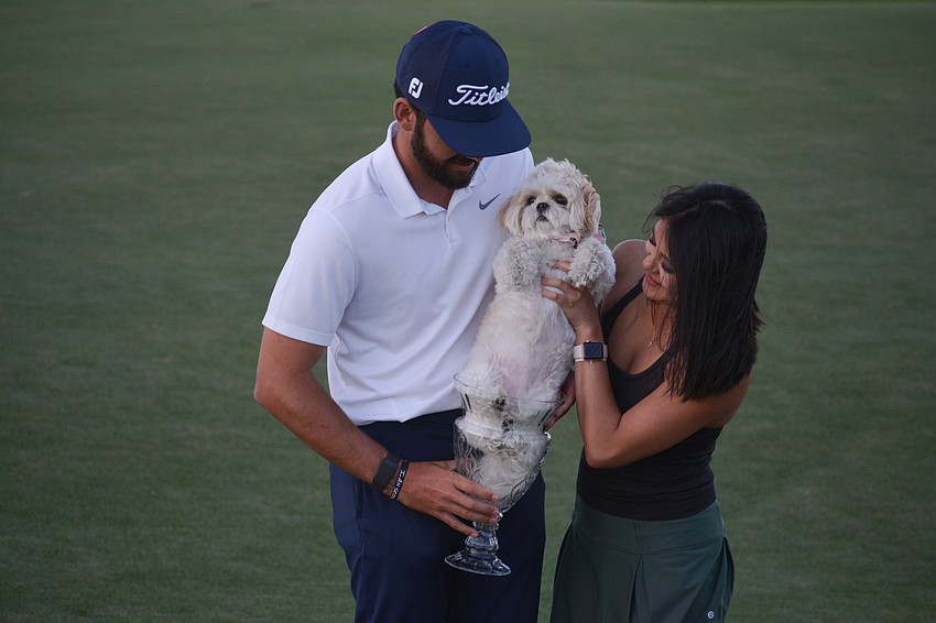 Hayden Buckley and his girlfriend, Feleysa Nguyen, tried putting their three-year-old dog Macy in the LECOM Suncoast Classic trophy. She didn't quite fit.