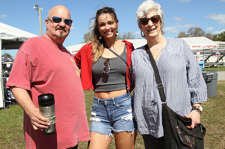 Andy Johnson, Jacque Newton and Jacque Rose walked around.