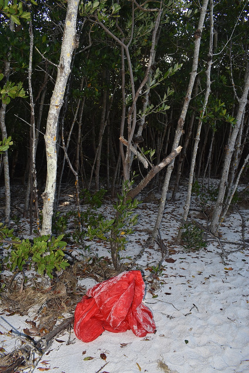 A watertight bag was left behind. Seamon picked it up on the way out of the cleanup.