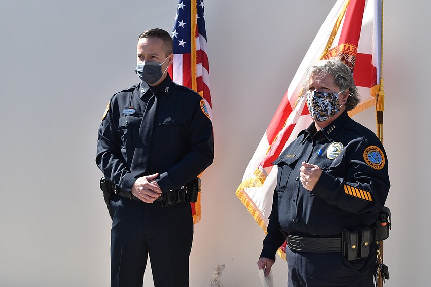 Doug Ferris (left) was sworn in as a Longboat Key police officer by Chief Kelli Smith (right).