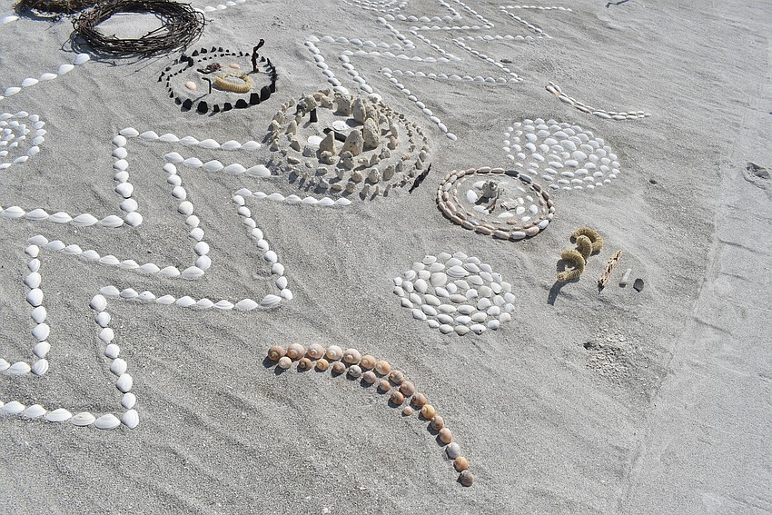 This half moon, made from tulip shells, is mirrored by another on the right side of the piece.