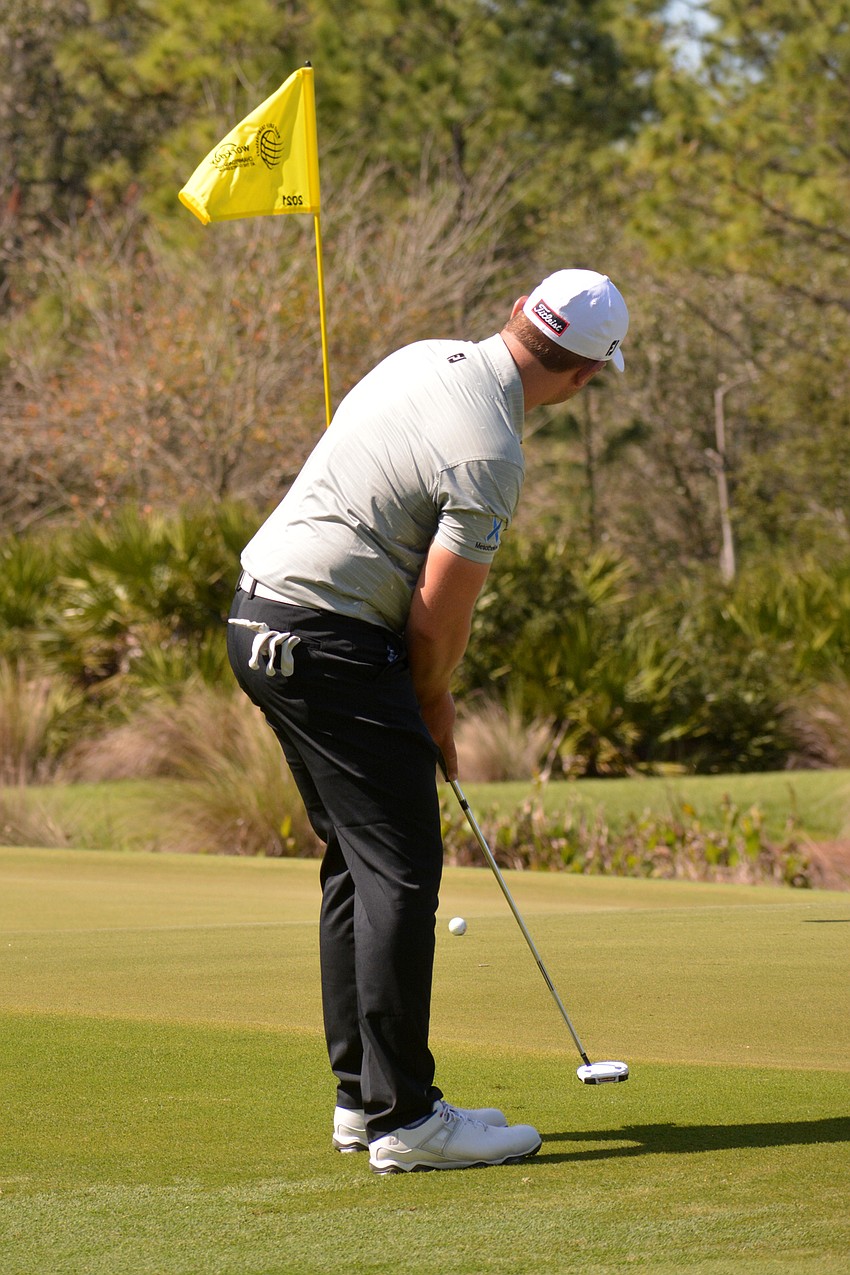 Yuki Inamori putts on the No. 11 hole at The Concession Golf Club. Inamori would bogey the hole. He finished the round one over par.