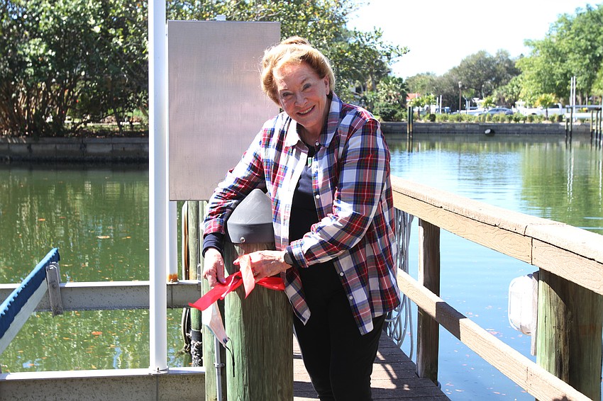 Margaret Jean Cannon tied a red ribbon on the dock.