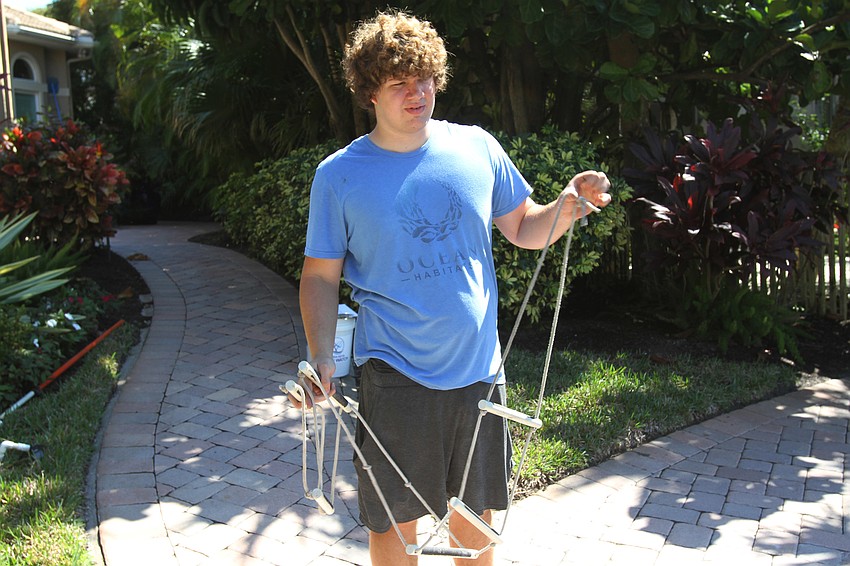 Alex Wolff set up the rope ladder for his brother to use to get out of the water.