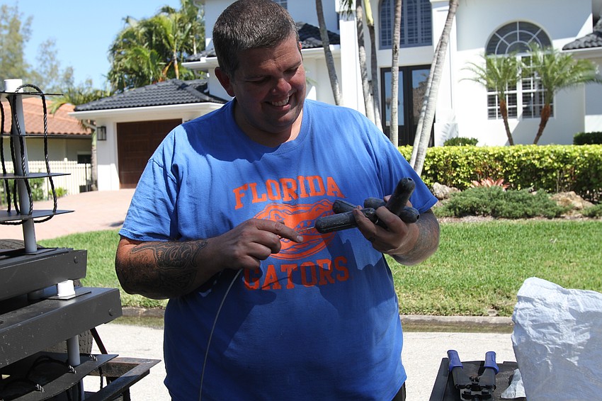 David Wolff set up various mini reefs for his sons to submerge and fasten to canal docks.