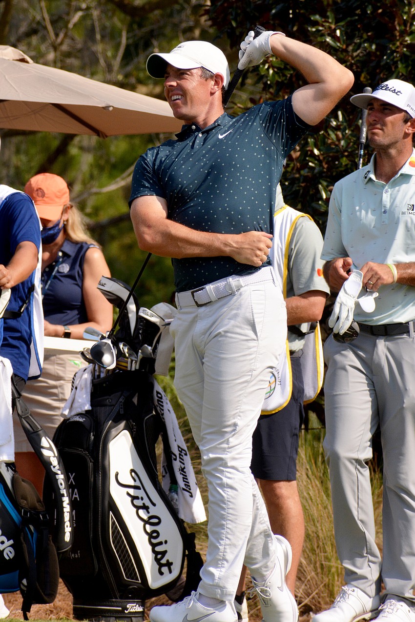 Rory McIlroy stares down his tee shot on the No. 10 hole at The Concession Golf Club. McIlroy would par the hole. He finished two under par for the round and is five under par overall.