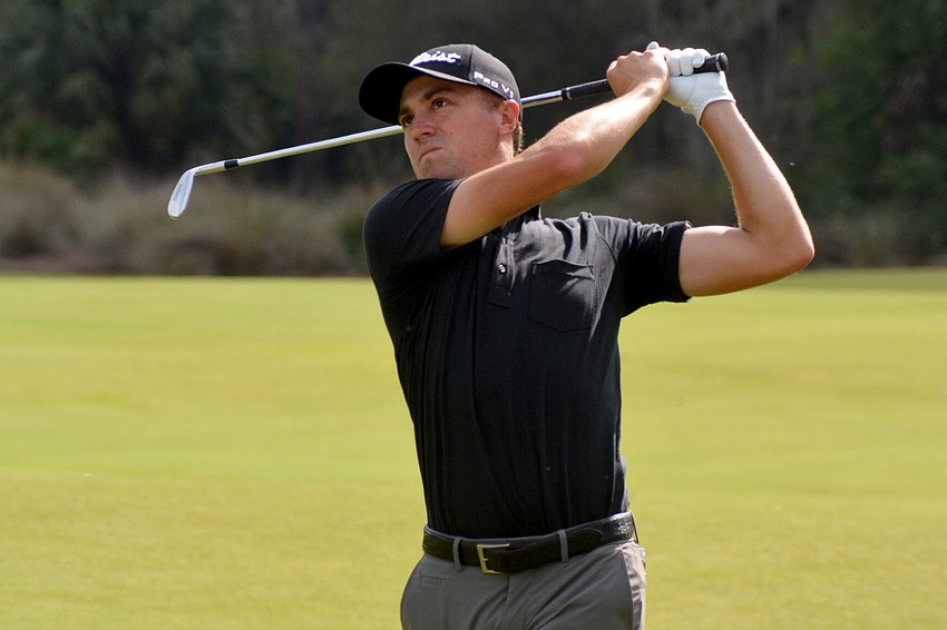 Justin Thomas his his approach on the No. 9 hole at The Concession Golf Club. Thomas would birdie the hole.