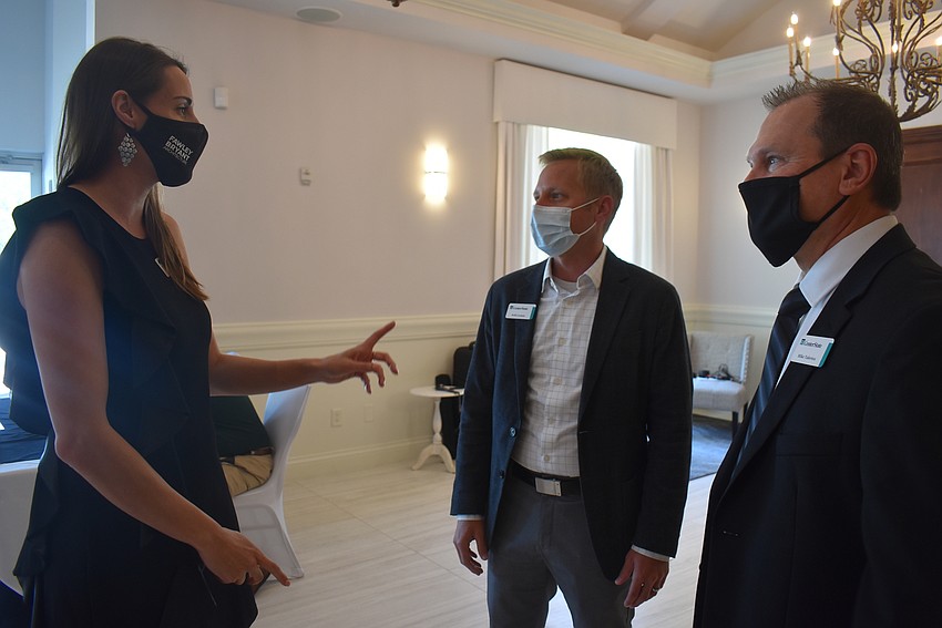 Amanda Parrish of Frawley Bryant Architecture talks with Will Cromie and Mike Talerico of CenterState. Parrish was later announced as the 2021 board chair.