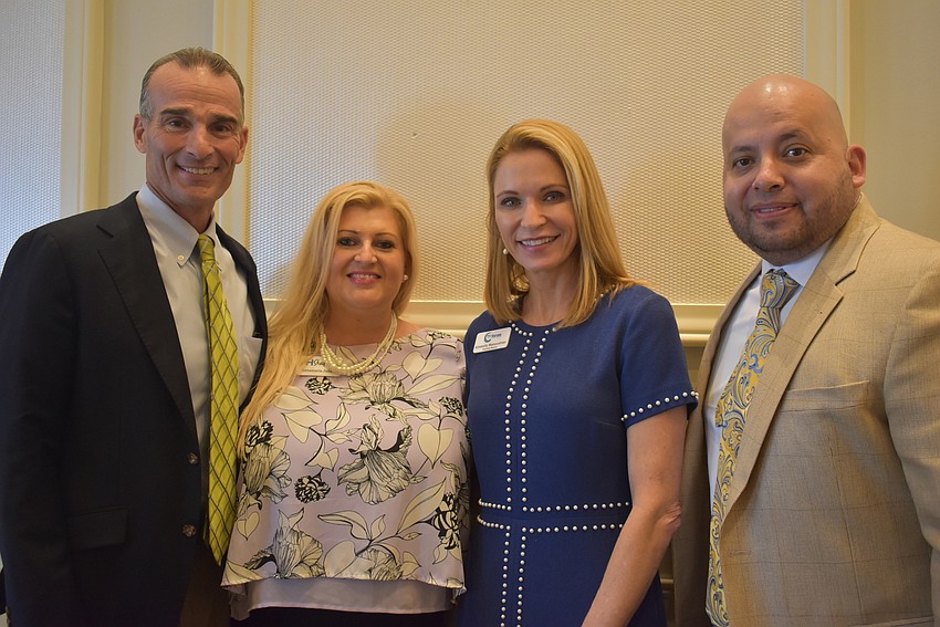 Darrin Rohr and Annamaria Juhasz of HH Staffing, Kimberly Manooshian of Gulf Coast CEO Forum and Manny Fandino of HH Staffing shared a table at the luncheon. Rohr is the owner of HH Staffing.