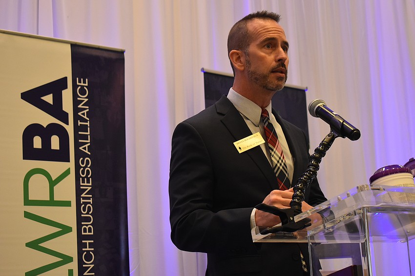 Bryan Boudreaux, senior vice president and marketing director for The Bank of Tampa, joked that he had to watch a YouTube video to remember how to tie a tie after so many virtual meetings because of the COVID-19 pandemic.