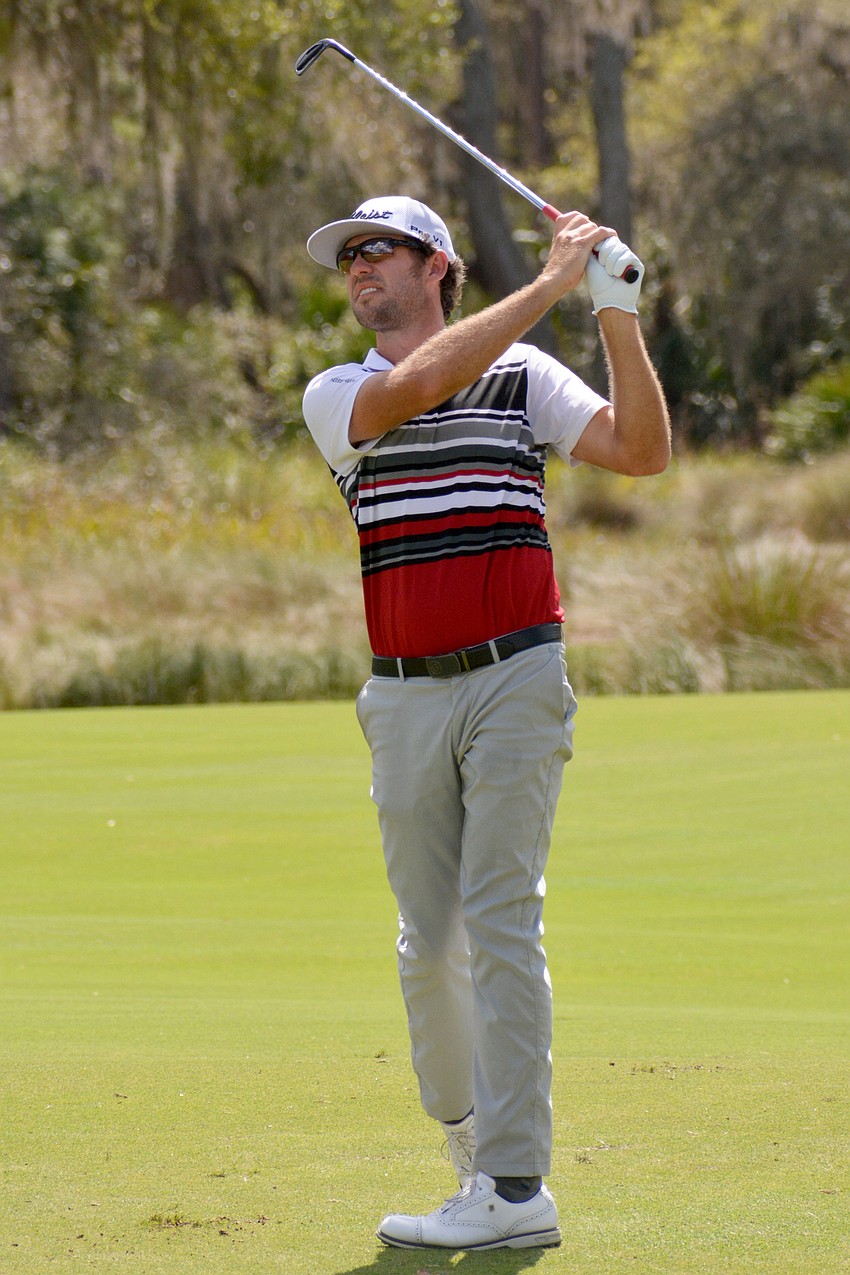 Cameron Champ his his second shot on the No. 9 hole at The Concession Golf Club. Champ would par the hole. He shot even par for the round and is two under par overall.