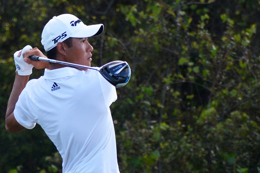 Collin Morikawa tees off from the No. 13 hole at The Concession Golf Club. Morikawa would bogey the hole, but shot five under par for the round to lead the field at 15 under par overall.