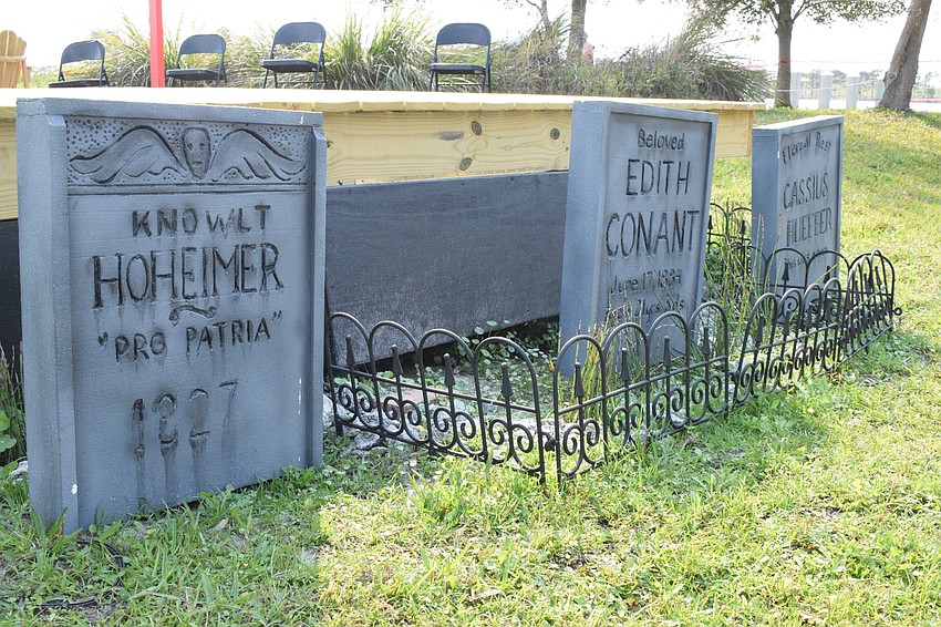Lakewood Ranch's Ken Junkins creates tombstones as props for the production.