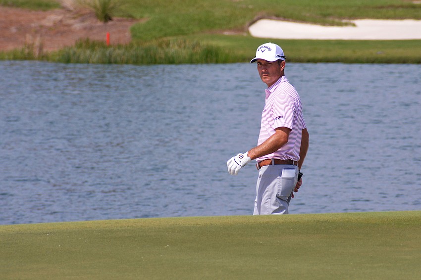 Kevin Kisner watches his chip shot on the No. 18 hole at The Concession Golf Club. Kisner would bogey the hole.
