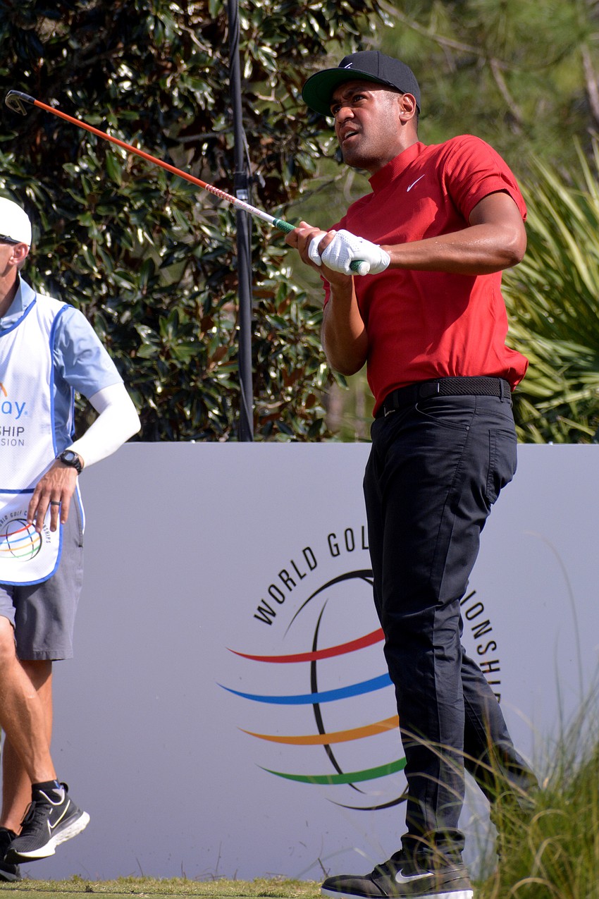 Tony Finau and other golfers wore red and black outfits Sunday to honor Tiger Woods and wish him well in his recovery. Finau finished the tournament nine under par.