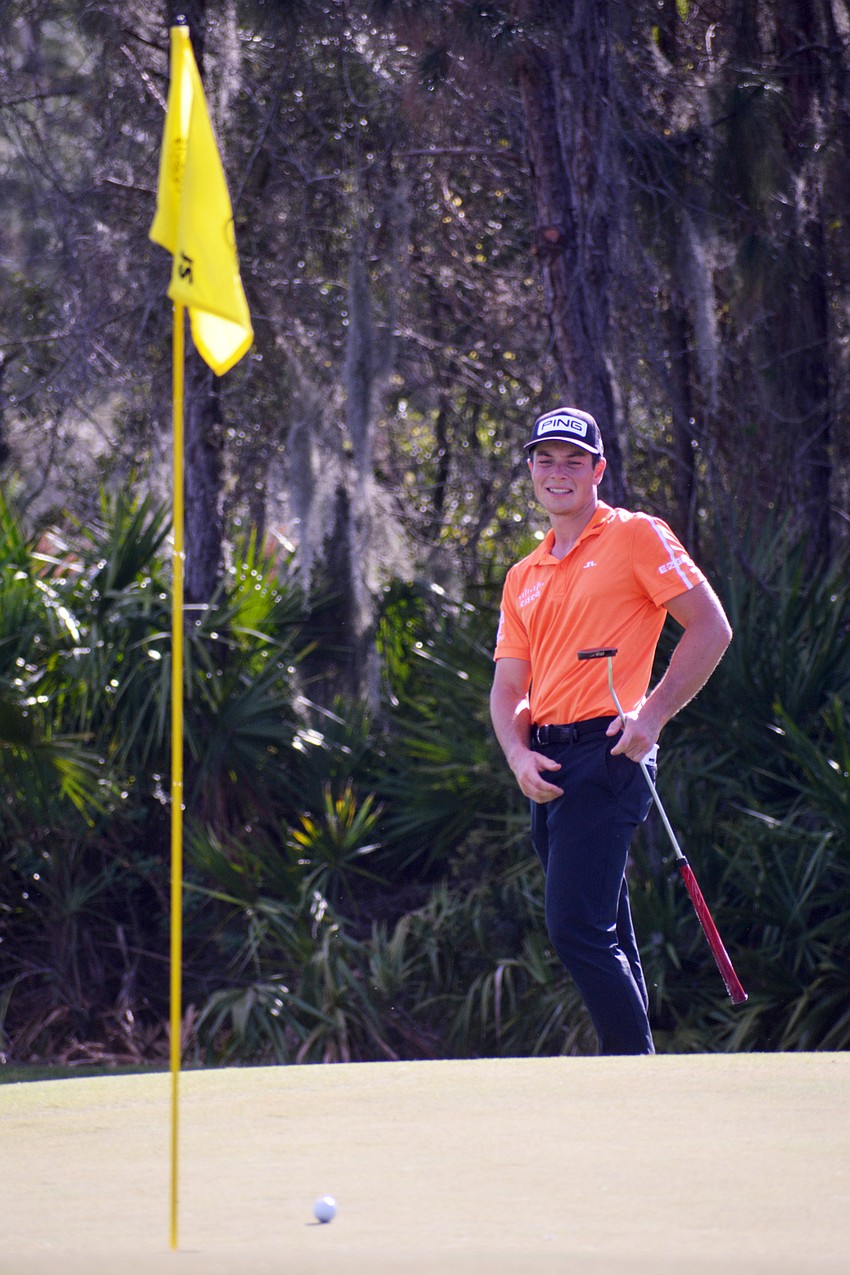 Viktor Hovland watches his chip shot on the No. 12 hole at The Concession Golf Club stop short of the pin. Hovland would birdie the hole. He finished the tournament 15 under pat (T2).