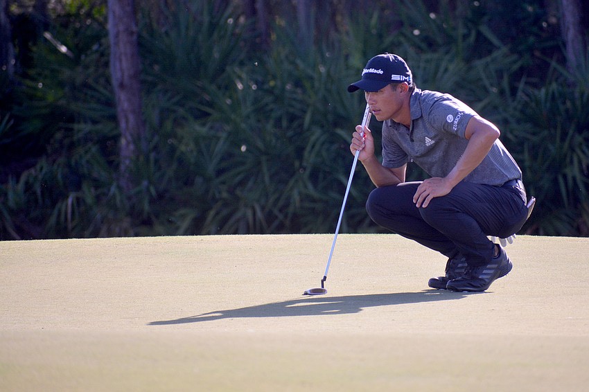 Collin Morikawa visualizes his birdie putt on the No. 12 hole at The Concession Golf Club. Morikawa won the tournament at 18 under par.