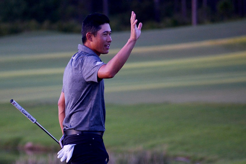 Collin Morikawa waves to the gallery after winning the World Golf Championships-Workday Championship at The Concession.