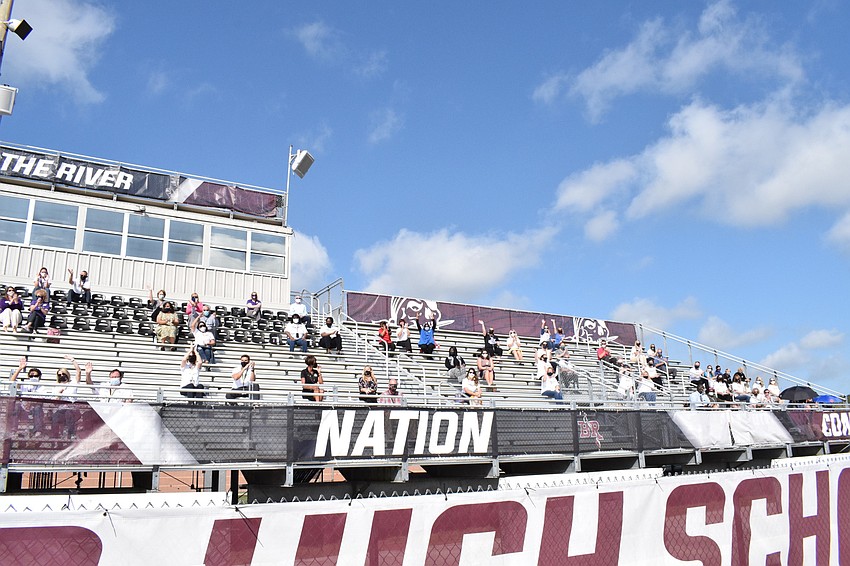 Dozens of School District of Manatee County employees participate in the kickoff to the district's Champions of Education event at Braden River High School.