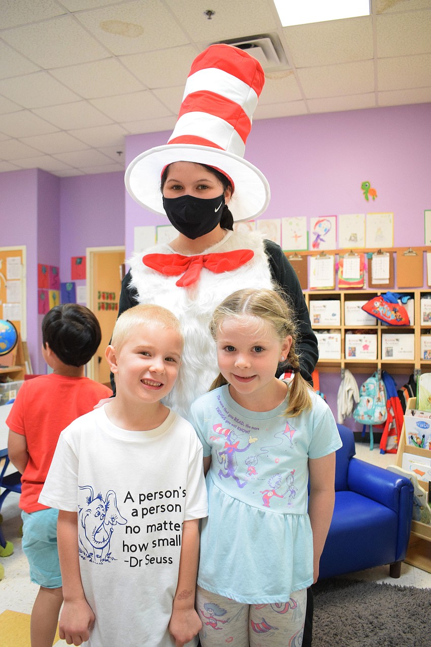 Kaden Wilson and Ellie McLellan wear shirts with quotes from 