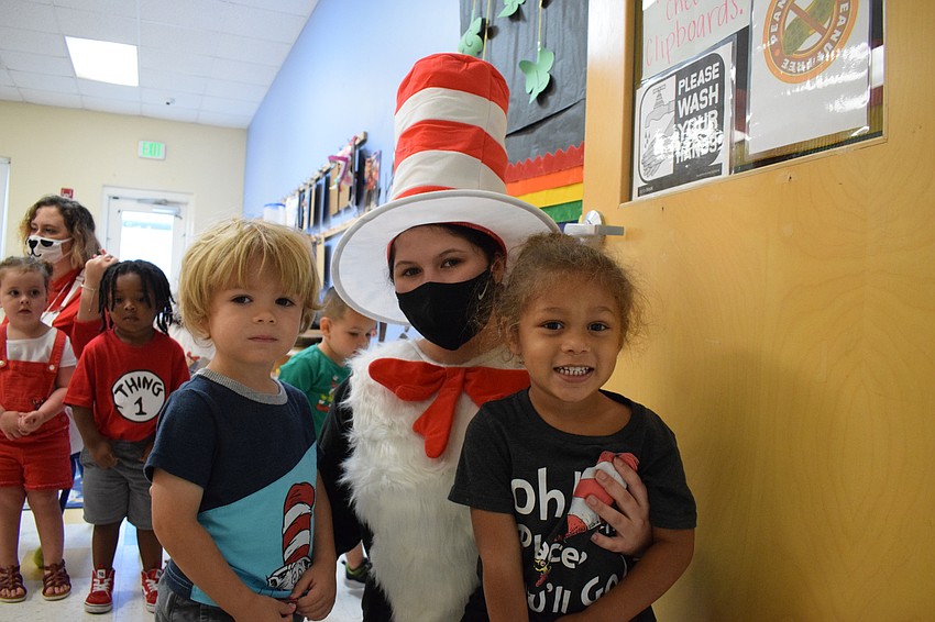 Logan Long, Mariah Esparza and Kingston Alberiton are ready to wish Dr. Seuss a happy birthday.
