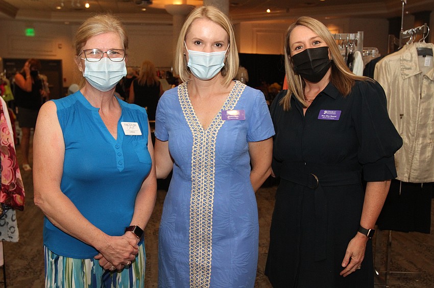 SPARCC Treasure Chest Manager Laura Thull, SPARCC President and CEO Jessica Hayes and Mary Ellen Mancini