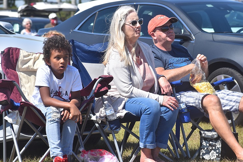 Zadyn Rivers, 7, and grandparents Linda and Chuck Cargin, who are from Sabal Harbour in east Bradenton, watch BMX riders do tricks. The Cargins love Nik Wallenda's work, but Rivers had never seen his show before.