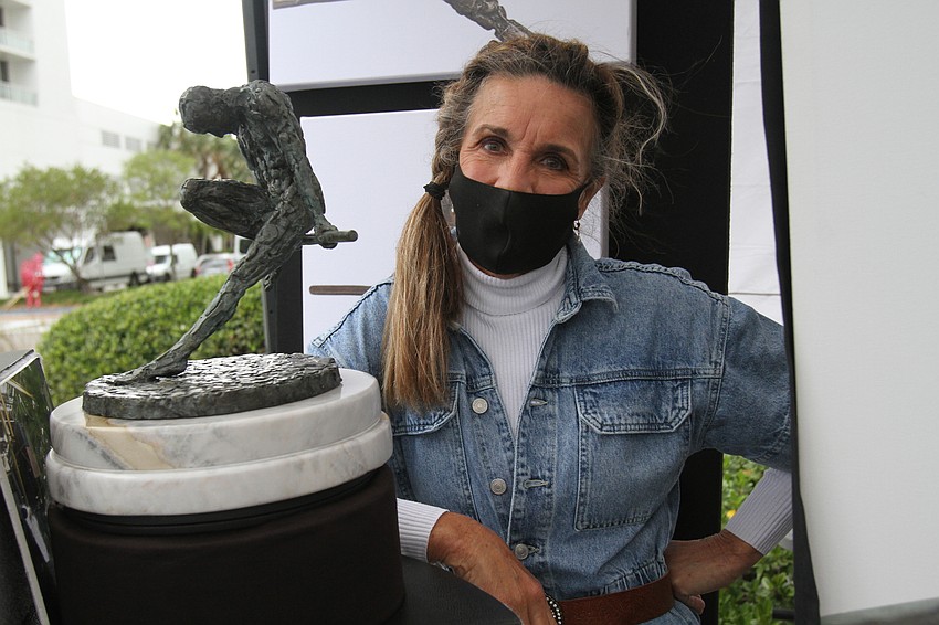 Lora Dobbs specialized in figurative bronze sculptures that gave a sense of line movement energy.