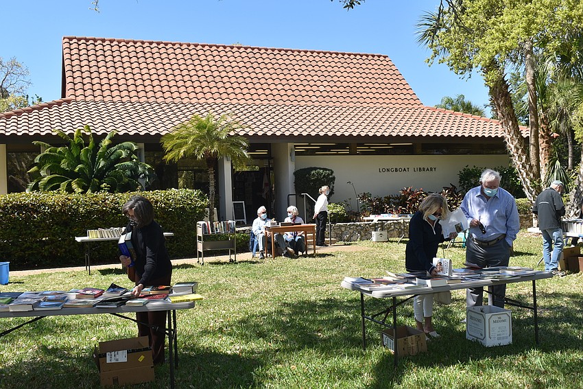 Shoppers enjoyed a sunny day free of the rain that canceled the sale on Saturday.