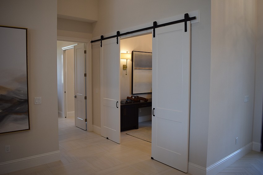 Sliding barn-type doors are popular, such as these in the Margo model.