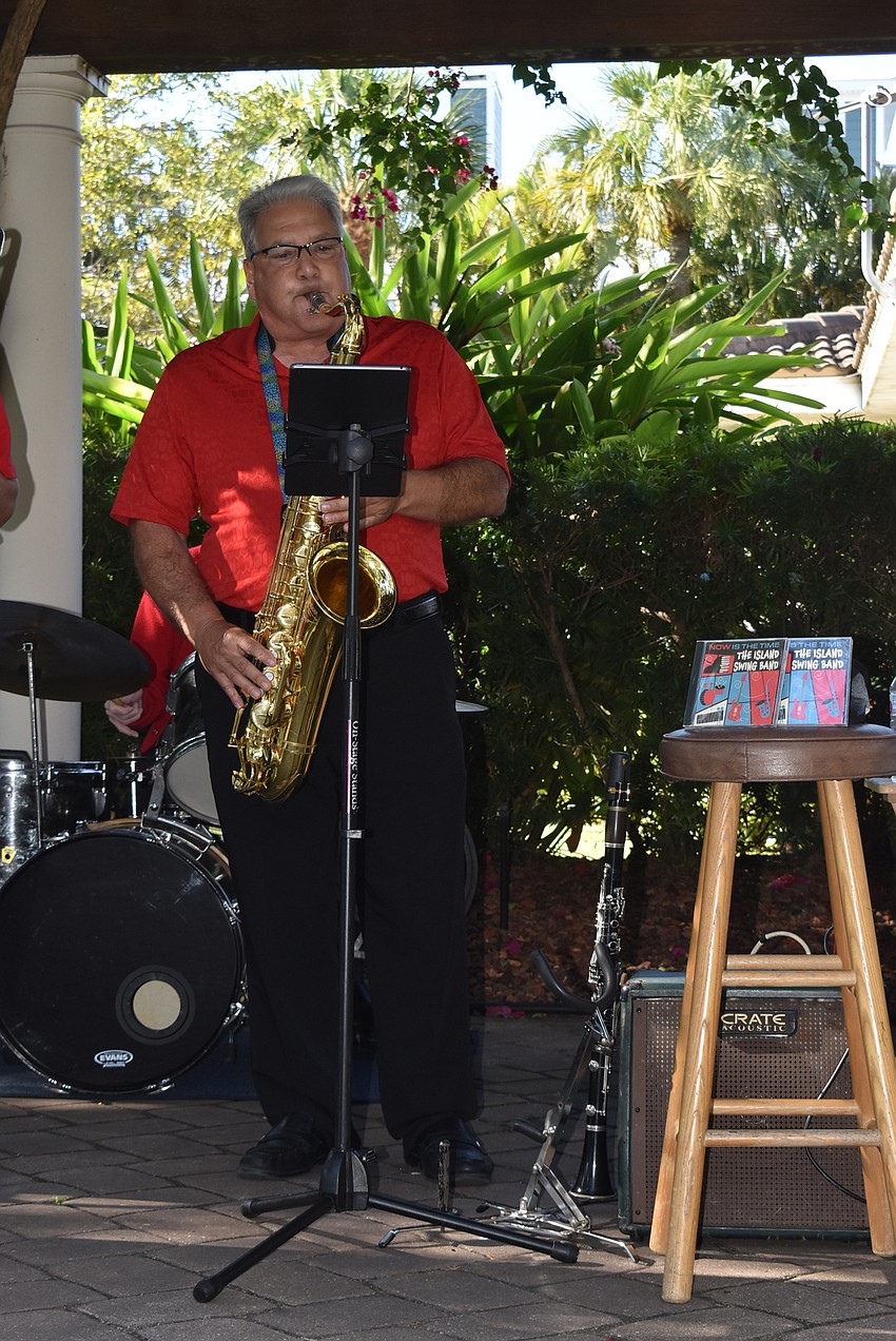 Tony Benade plays the saxophone.