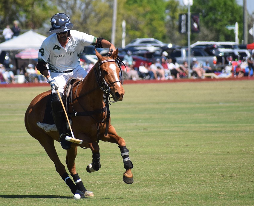 Barefield's Martin Ravina passes up the field.