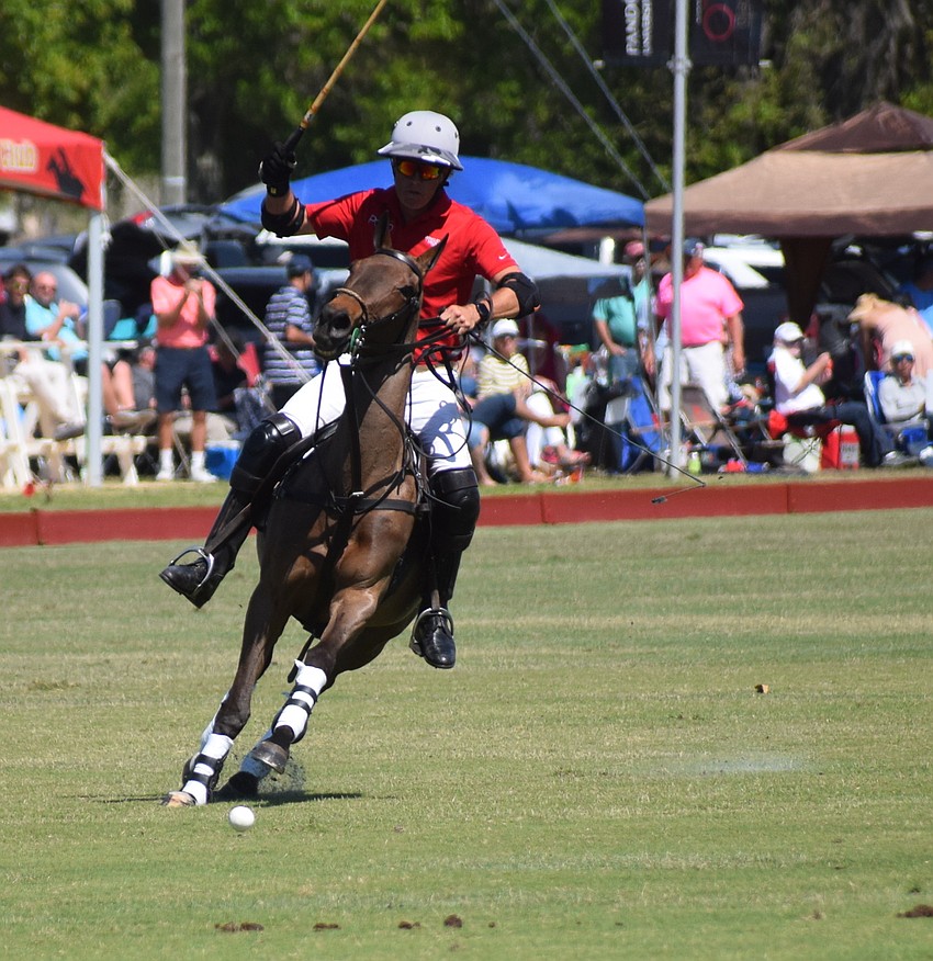 James Miller of Hillcroft breaks away from the pack.