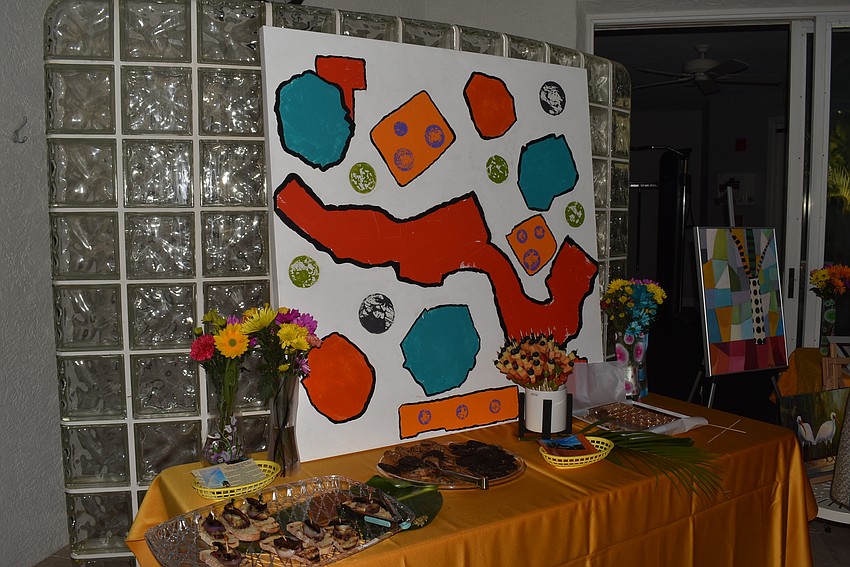 Residents could grab a bite to eat, framed by another painting.