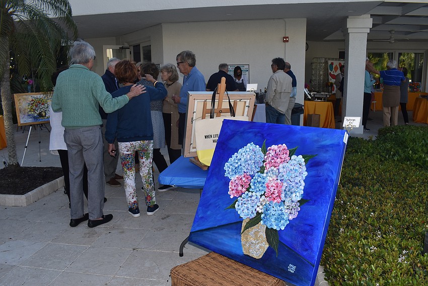 Residents mingled amongst the art.