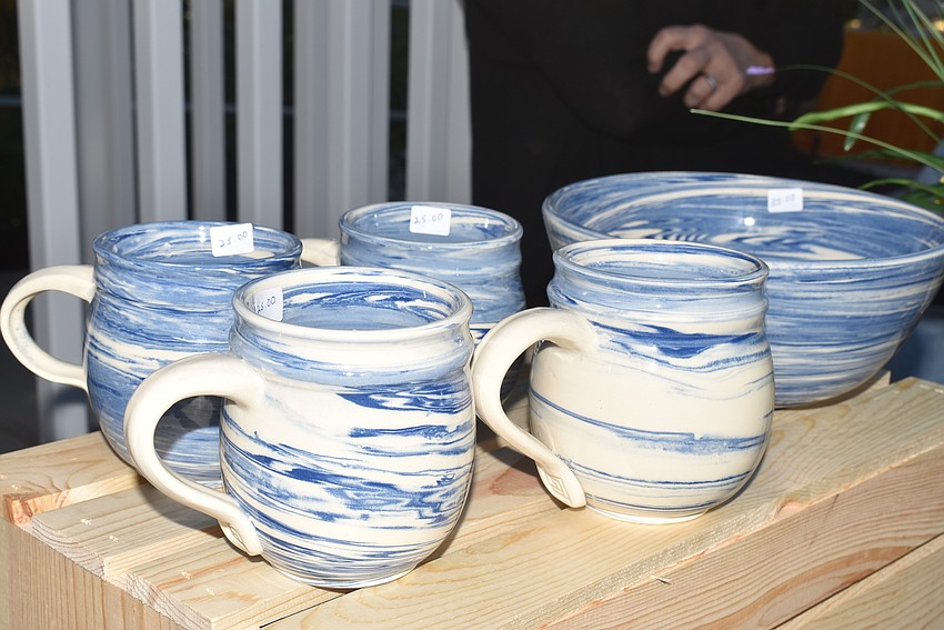 Mindee Marks sold pottery at her table.