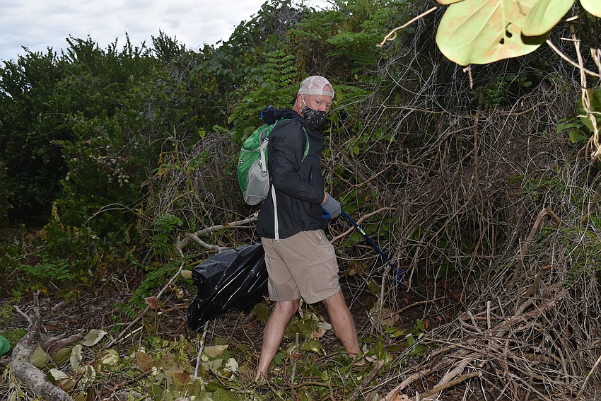 Jay Hart heads into the mangroves.