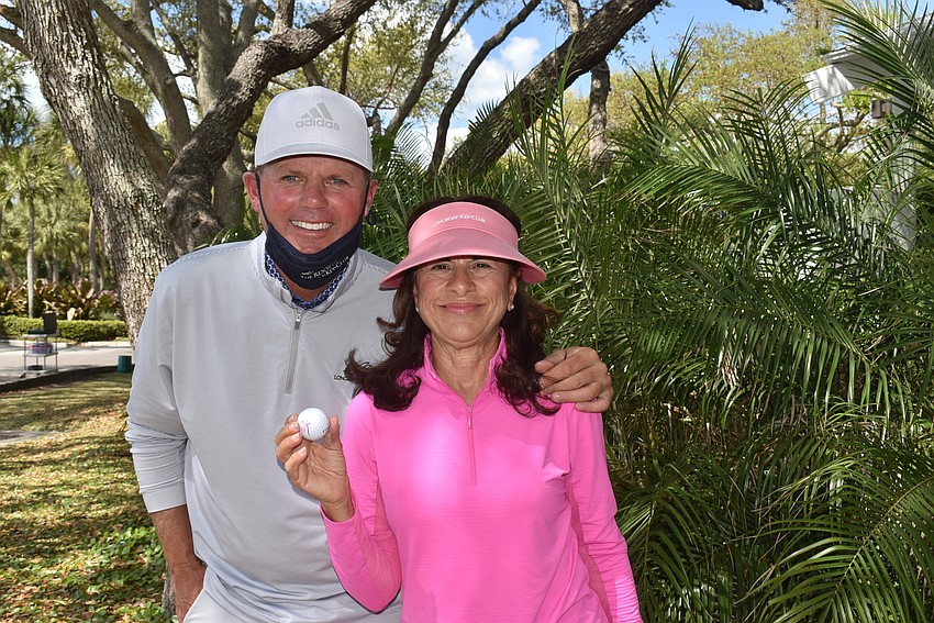 Terry O'Hara with Jeanne Musorofiti, who shot a hole in one.