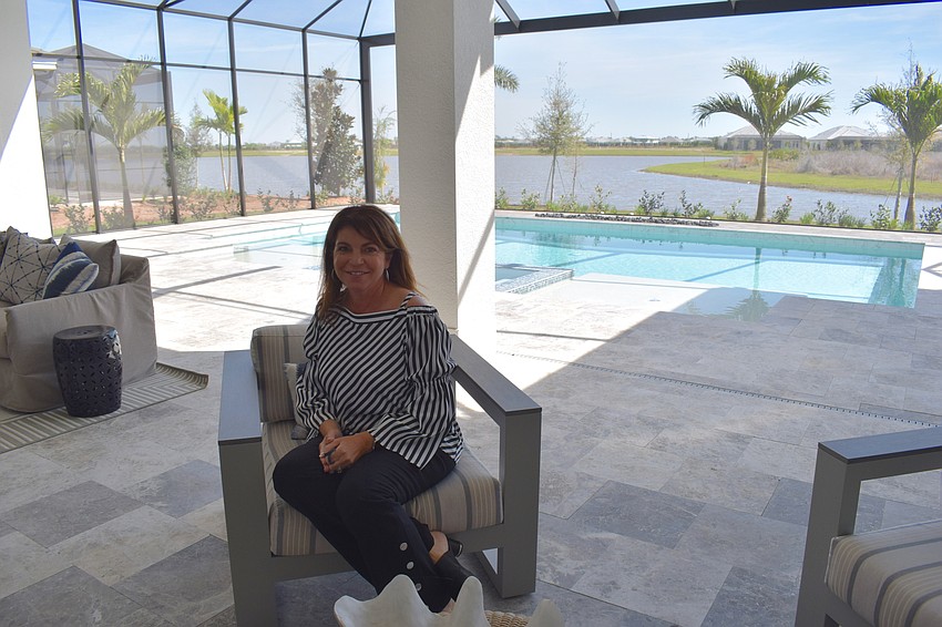 Stock Area Sales Manager Debbie Urban enjoys some down time on the Clairborne lanai.