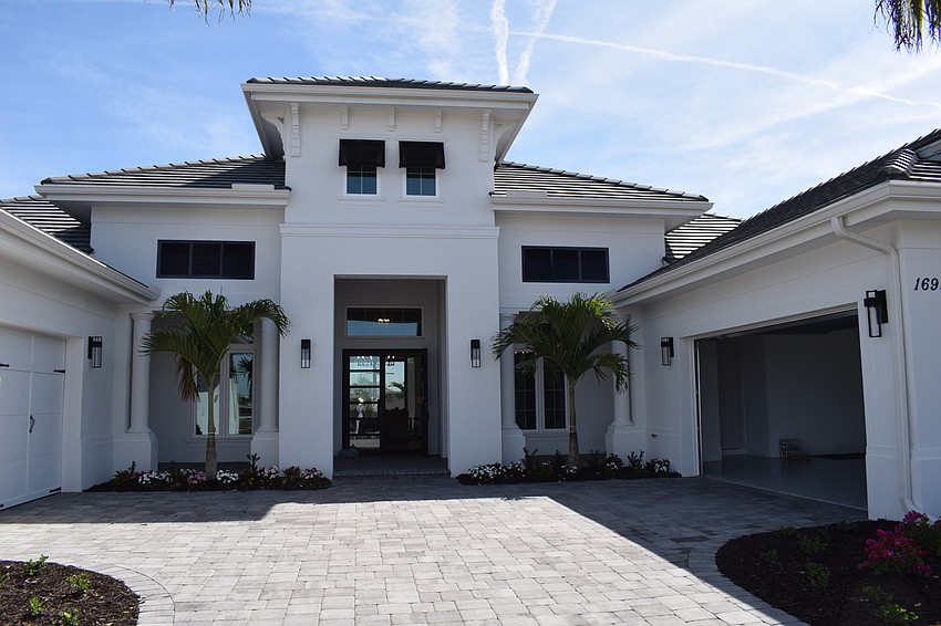 The Clairborne  has two separate, facing two-car garages.
