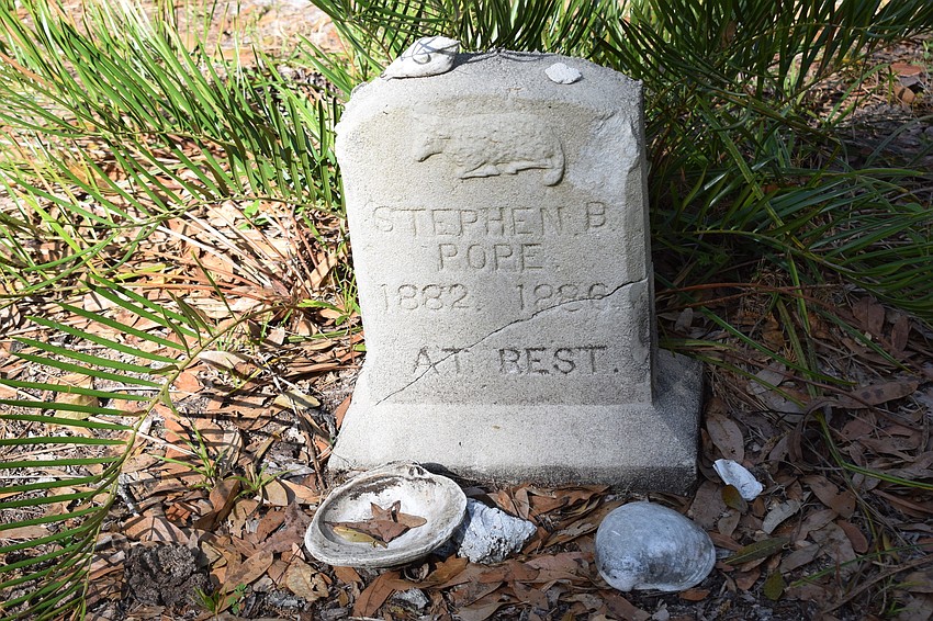 Shells, stones, shark teeth and even money are left at the site to honor those who have died.