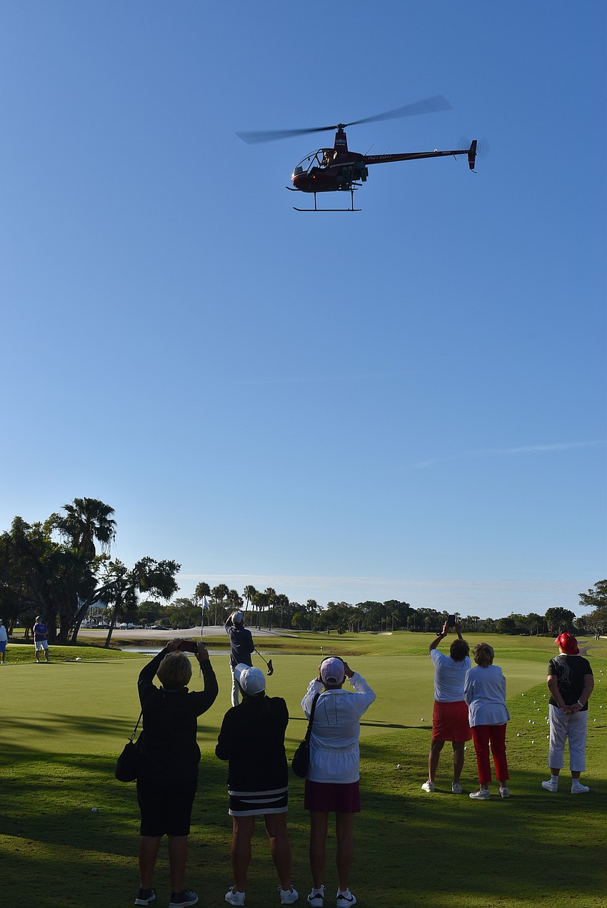 The day started with a helicopter ball drop.