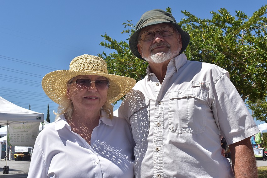 Port Charlotte residents Brenda and Dennis Peck enjoyed the market on the afternoon of March 13 after spending the morning going to markets and festivals in Port Charlotte.