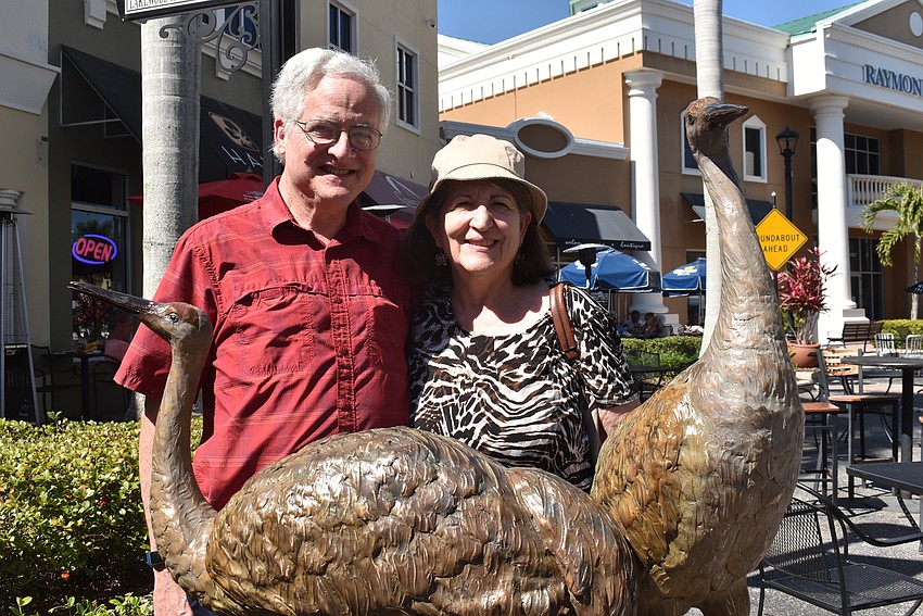 Indigo residents Steve and Linda Gooen stand behind Sandhill Crane Pair, created by Ben Foster Bronze Sculpture. The sticker price for the sculpture was $14,500.