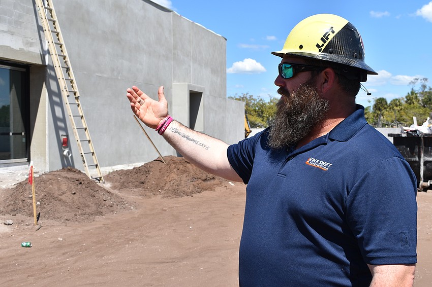Jon F. Swift Construction superintendent Shane Hamm demonstrates how the entrance for Fire Station 92 will be on the south side of the building.
