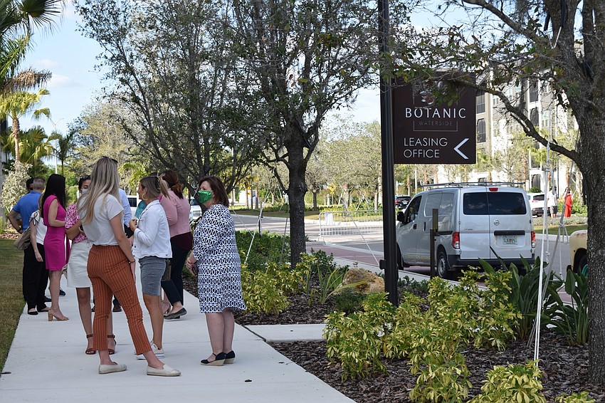 People gather for the grand opening of Botanic Waterside.