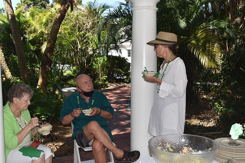 Meredith McKinley chats with June McBride and Larry Mundt.