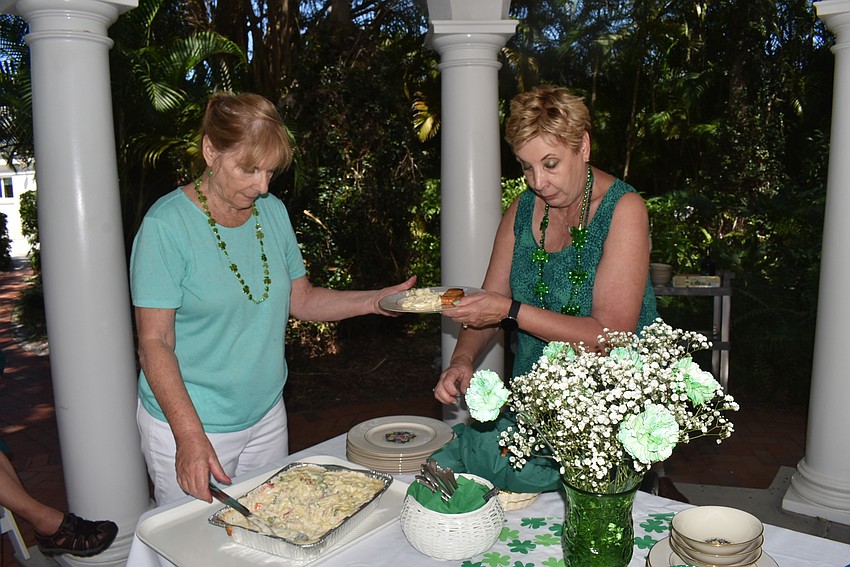 Hostesses Valarie Evanko and Karen Pashkow served the main course.
